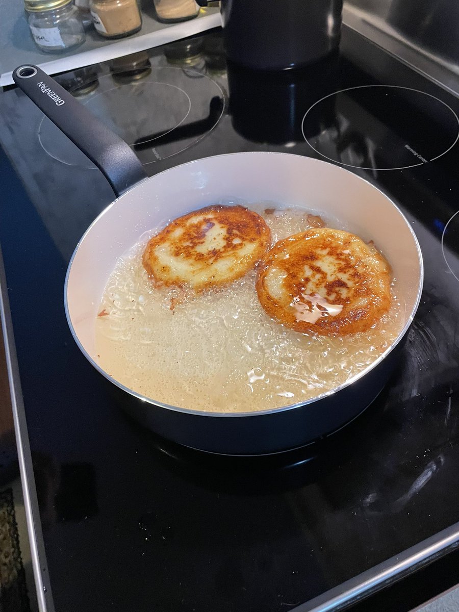 Dinner tonight.  My wife made potato pancakes with pork and sauerkraut, kielbasa with sour cream, mustard and cilantro 
It was so good