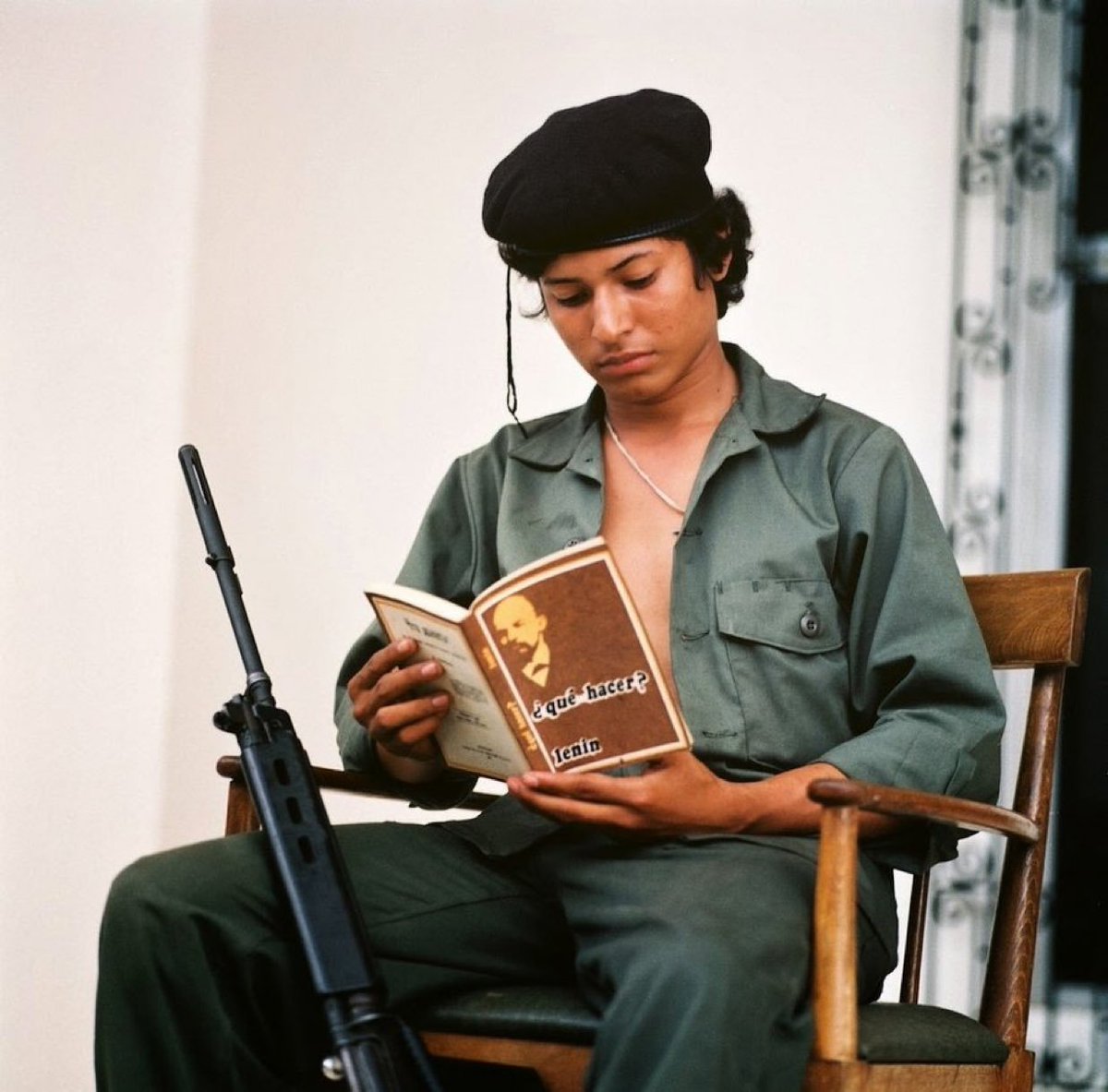 A young man reads Lenin's book "What is to be done?". Nicaragua, 1983.