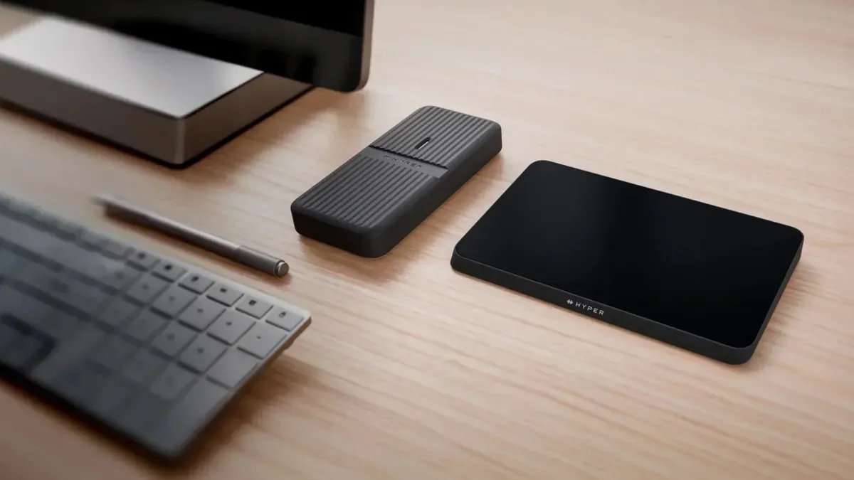 procrastinell4's tweet photo. Hyper unveils innovative accessories at CES: TrackPad Pro for Windows gestures, USB4 NVMe enclosure, and smart solid-state Qi2 power banks with FindMy support. Tech upgrades incoming!  https://t.co/na1I16nNPk https://t.co/KQJDX9mhbV