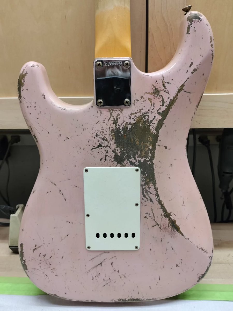 Fender's tweet image. We're loving this '62 Shell Pink Strat with a Brazilian rosewood fretboard Strat from Jason Smith headed to Rainbow Guitars. 🩷