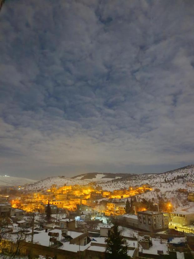 🌙❄️“Köyün ışıkları, karın sessizliğinde dua gibi yükselir göğe.”  

#Güreniz
