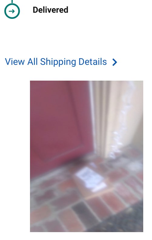 johnlaudun's tweet photo. When @UPS sends you a blurry picture of your NEIGHBOR’s step as proof of delivery. https://t.co/QBNR43FKWo