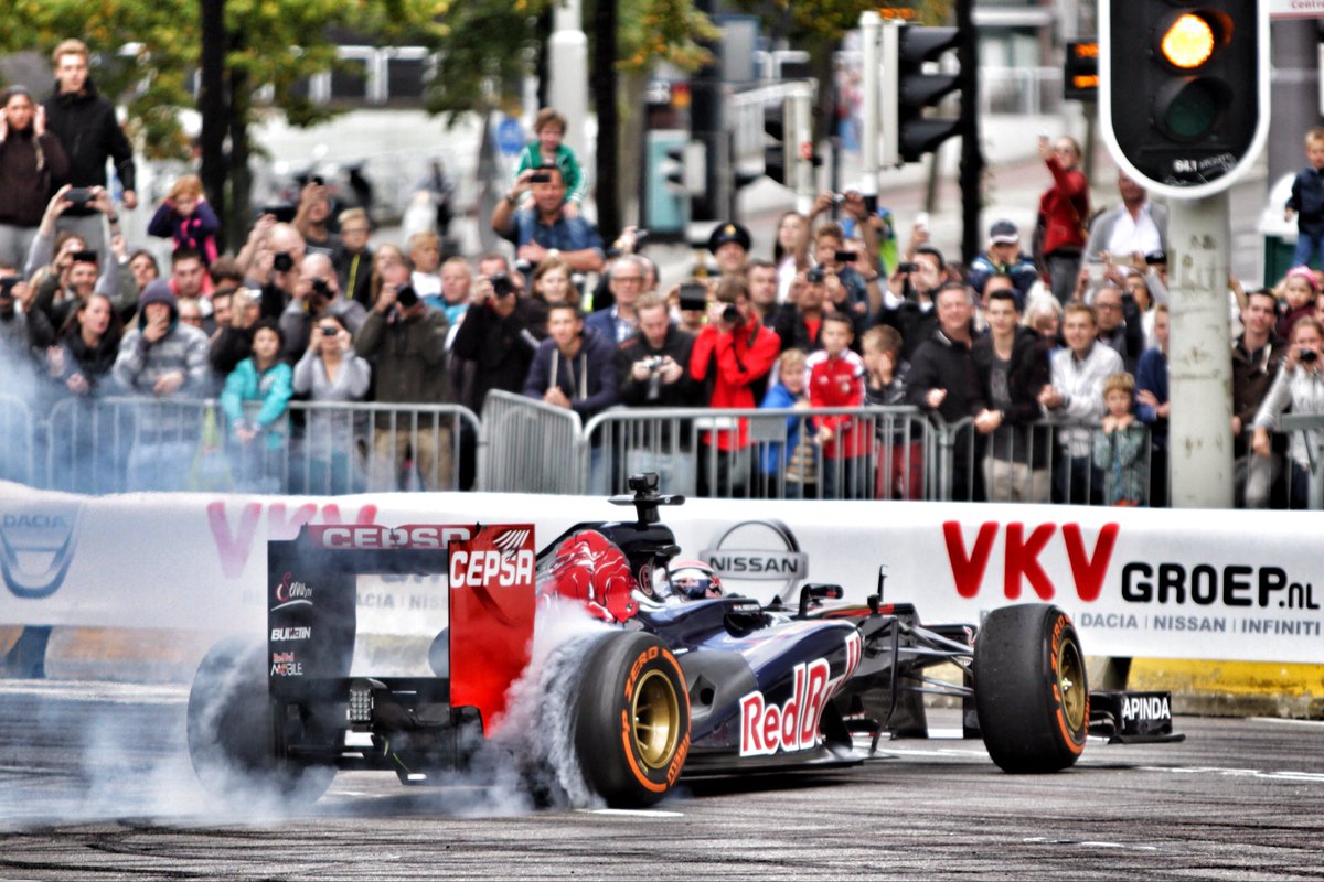 strnbrg's tweet photo. @UnracedF1 Great event. Shame it got cancelled. This is from 2014. Max in a Red Bull, with Toro Rosso colors. A drifter, they had the best shows, always. Kimi in his Ferrari. https://t.co/9wUvhuuSV1