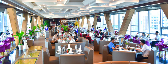 Explore_DPRK's tweet photo. Hwasong Kumgang Restaurant is quickly becoming a local favorite with scenic views, traditional dishes like Pyongyang cold noodles, and a unique glass-walled restaurant experience. https://t.co/l9TaJ3V7O1