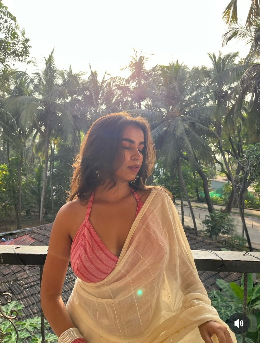 Sunlit in saree, soul aglow