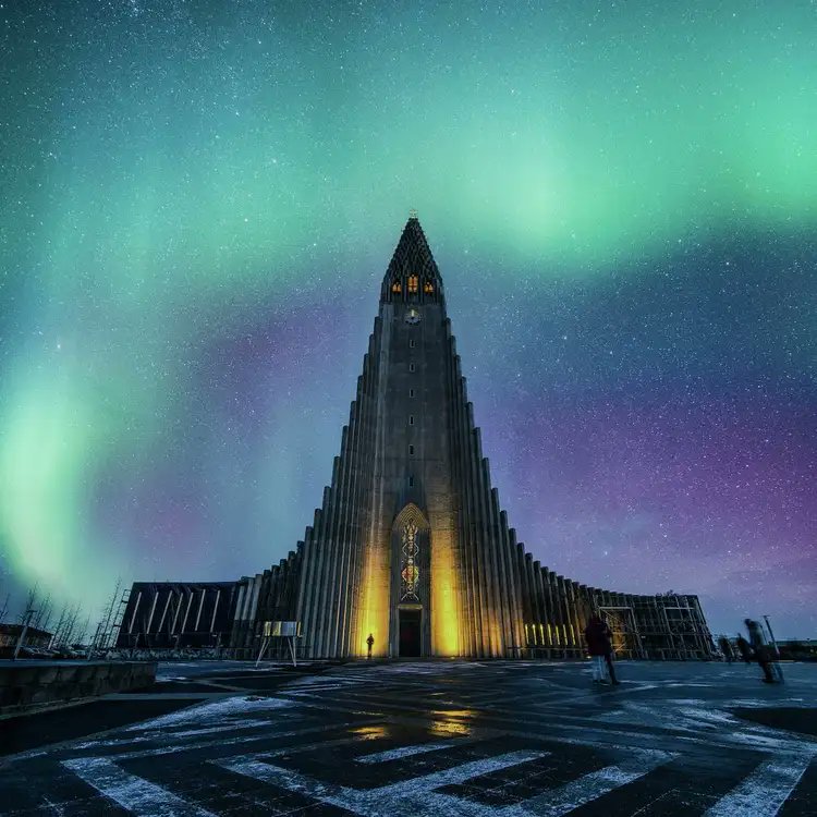 Trip's tweet image. Reykjavík feels like the edge of the world — steam rising from hot springs, snow underfoot, and the sky dancing green above you. Time softens here. Explore more at trip.com/travel-guide/d…