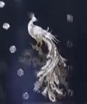 HONGSMINGKI's tweet image. the same cloud patterns were shown during their gayo stage today along with dragons and birds (peacock and i think japanese cranes but dont quote me on bird types) on their outfits….oh these crazy details WE LOVE YOU ATEEZ!!! this is soooo cool