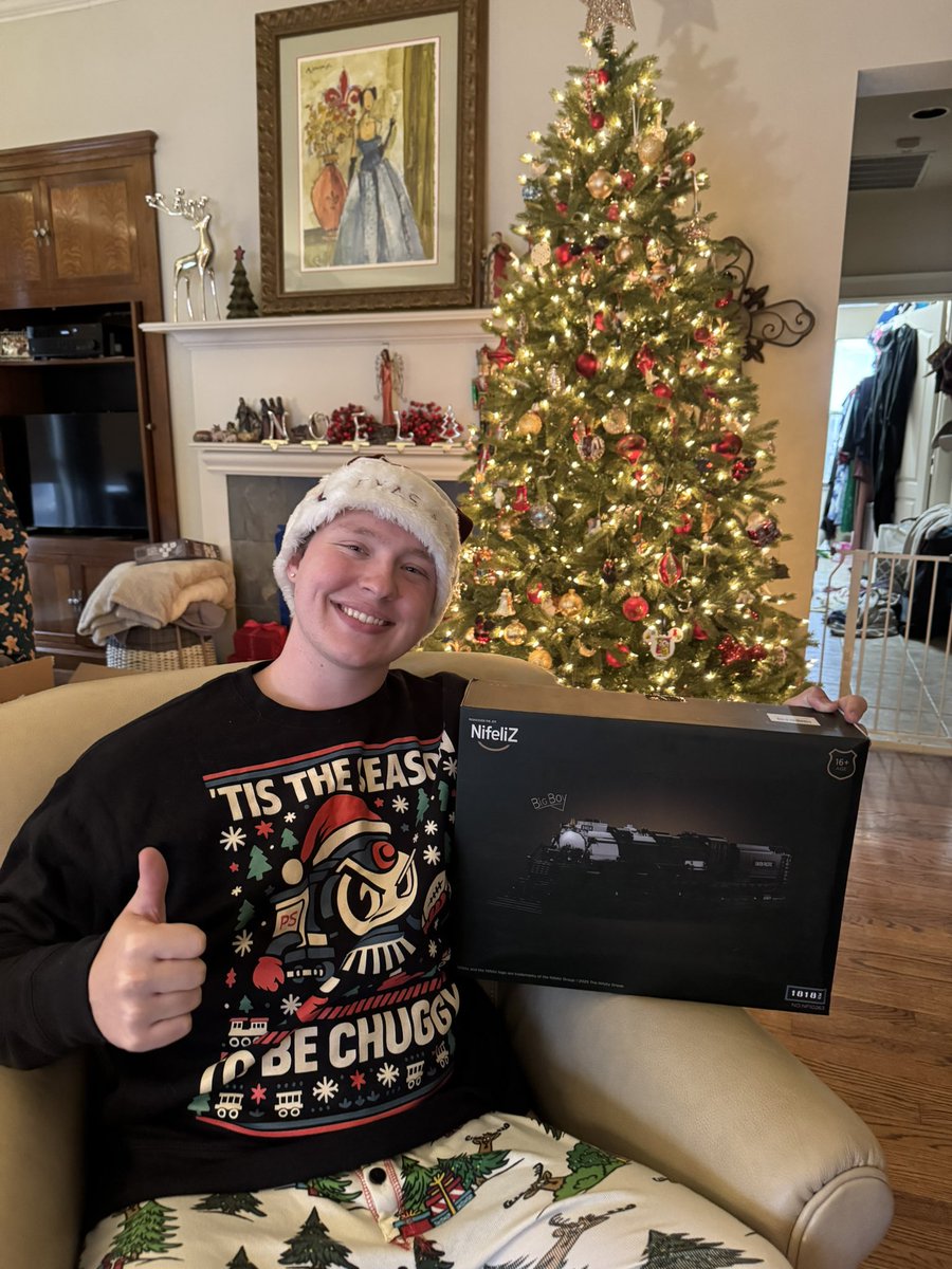 graytrain0122's tweet photo. You know it’s a great Christmas when you get @JoshPateCFB chugging merch and a train Lego set! Merry Christmas and happy new year, Gig’em! https://t.co/qAbo1RBB77