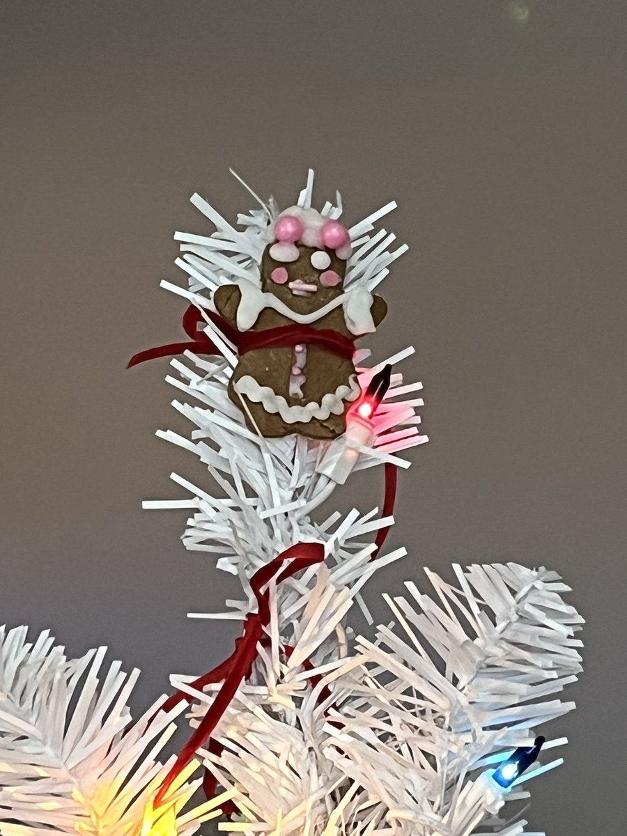 My mom tied gingerbread cookies to a tree, which is a cute concept, but she put this little one on top and said “it’s an angel” but it looks like the “angel” is a sacrifice to be burned on the stake 😂