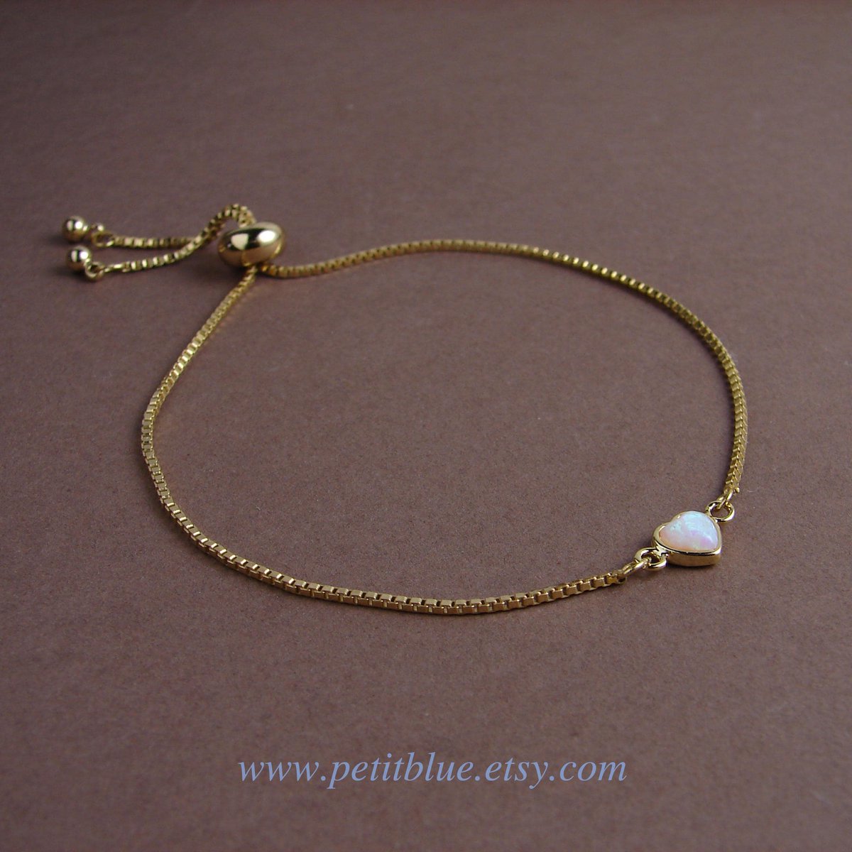 JewelryByMikako's tweet image. Small Opal Heart Bracelet ~ Adjustable Gold Plated Bracelet ~ October Birthday ~ Gift for Her ~ Everyday Jewelry tuppu.net/134a480b  #FreeSize