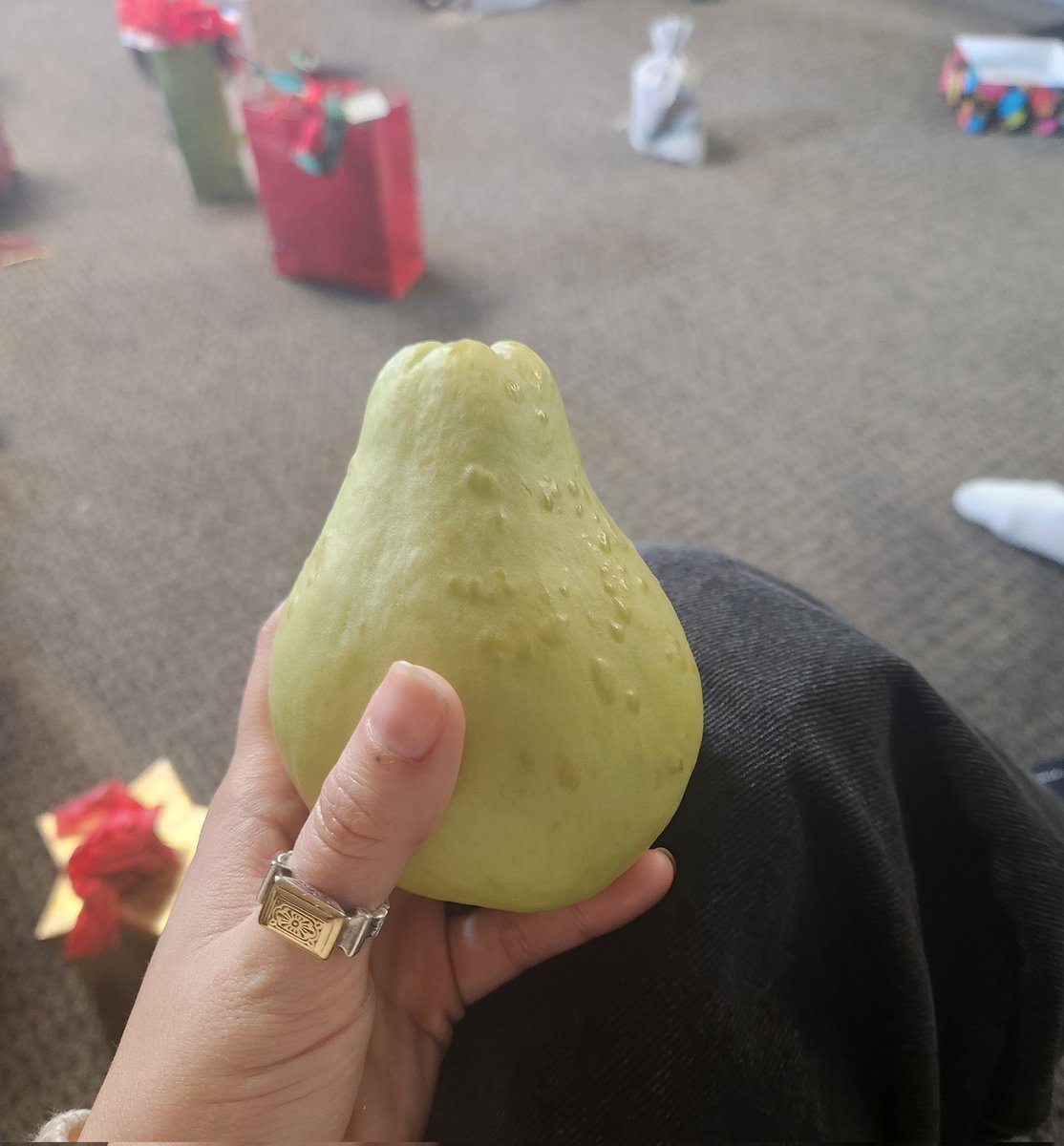 I got Mamaw's gift in White Elephant.. It's a single fake pear LOL