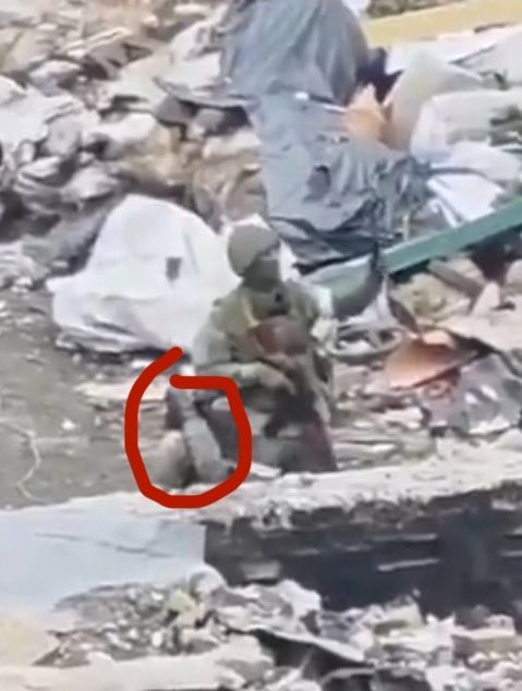 fish_yes73002's tweet photo. @ClipsOfMovie From what i can think off. that this guy is already dead, since his leg is over his shoulder. and his body is straight while on the ground meaning. that this lower body is no longer there, what the exploision was is my question. https://t.co/Az7mClEf1M