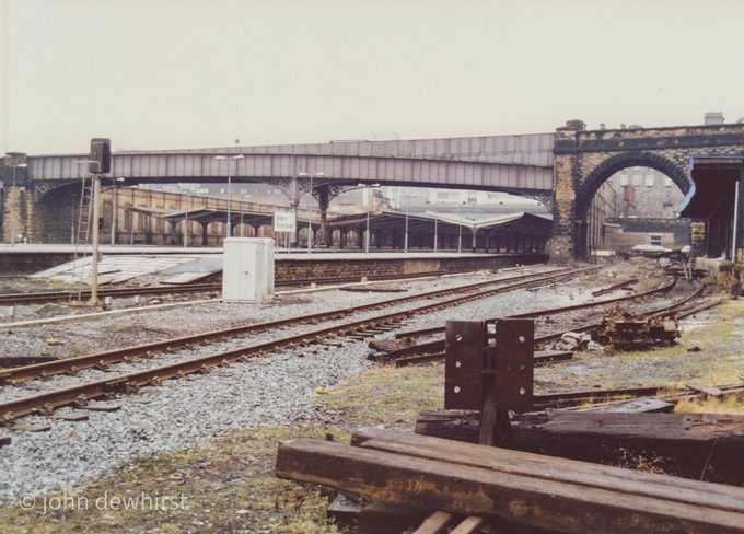 jpdewhirst's tweet photo. From 1986 of Bradford Forster Square railway station, by then run down to a skeletal service and semi-derelict. The now demolished School Street road bridge connected Manor Row and Valley Road.  #industrialheritage #Bradford https://t.co/2OLVKD54VR