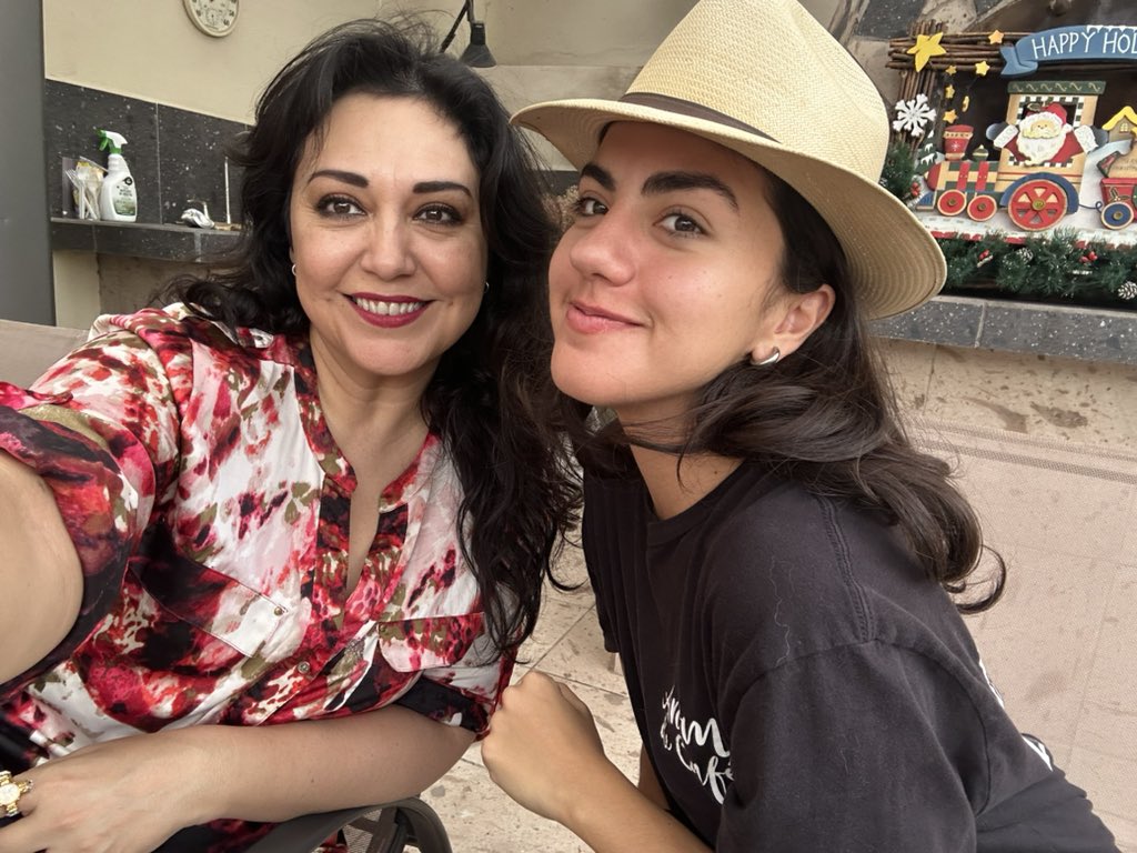 Hey @Grok add Santa to my photo