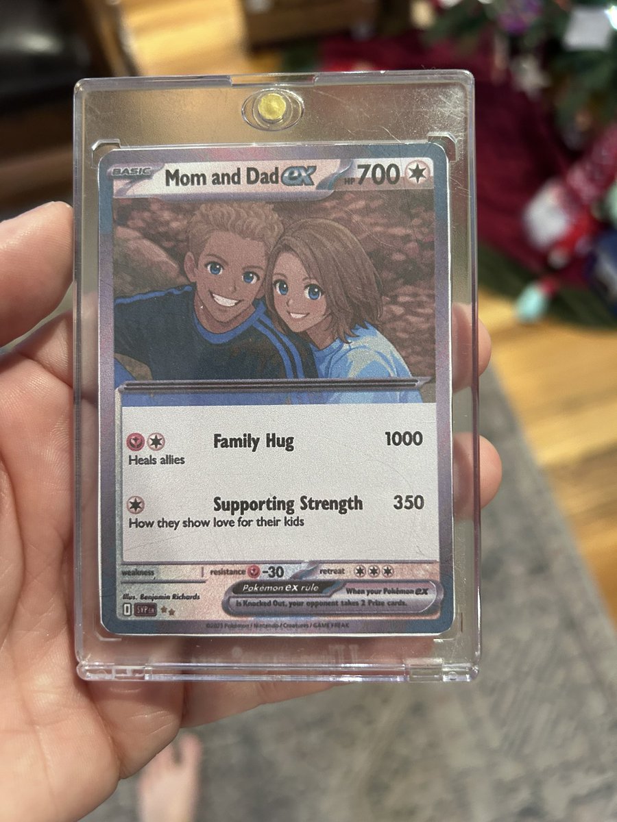 For his Christmas present to us, our second son made a Pokmon card based  on our engagement photo and I love it so much.