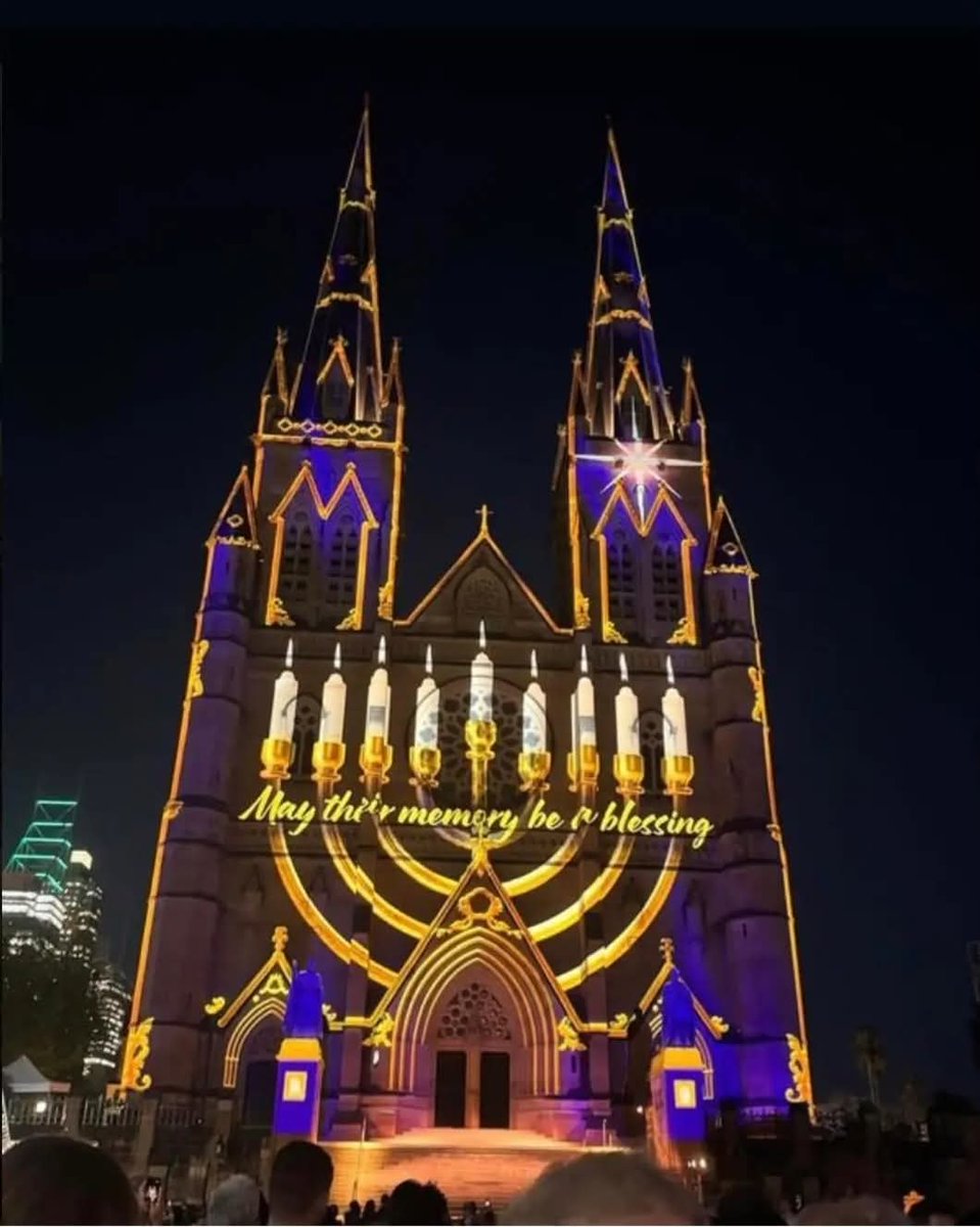 A beautiful Christmas message: a menorah was beamed into St. Mary's  Cathedral in Sydney, Australia., image size:959x1200