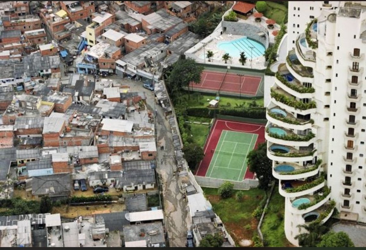 justMangesh's tweet photo. I chose this image because it captures "the wall." Inequity isn't just a statistic; it’s the literal proximity of extreme wealth to extreme poverty, where a single fence separates luxury from survival. #Inequity #F4E https://t.co/UvSYCCzW6C