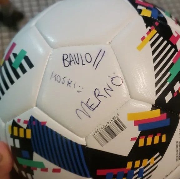 la carita al lado de la firma dios moski te adoro