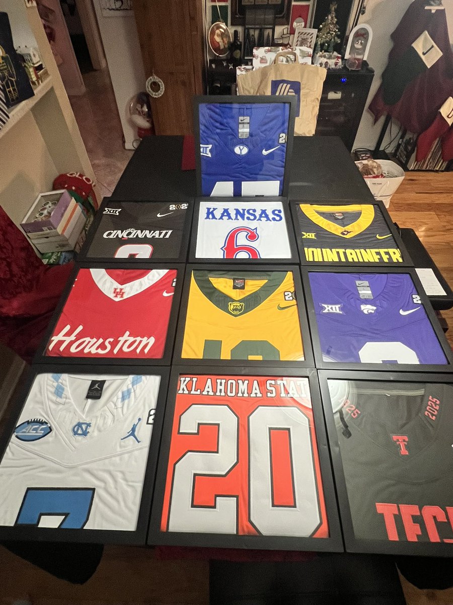 LennyLeonardNYC's tweet photo. Wanted to get Vince something for Christmas to remember his 1st yr of work in college football so I got him a jersey from all 10 P4 schools that #UCF played this year &amp; framed them 

#BYU/#Cincinnati/#Kansas/#WestVirginia/#Houston/#Baylor/#KansasSt/#NorthCarolina/#OkSt/#TexasTech https://t.co/ynCSFib8In