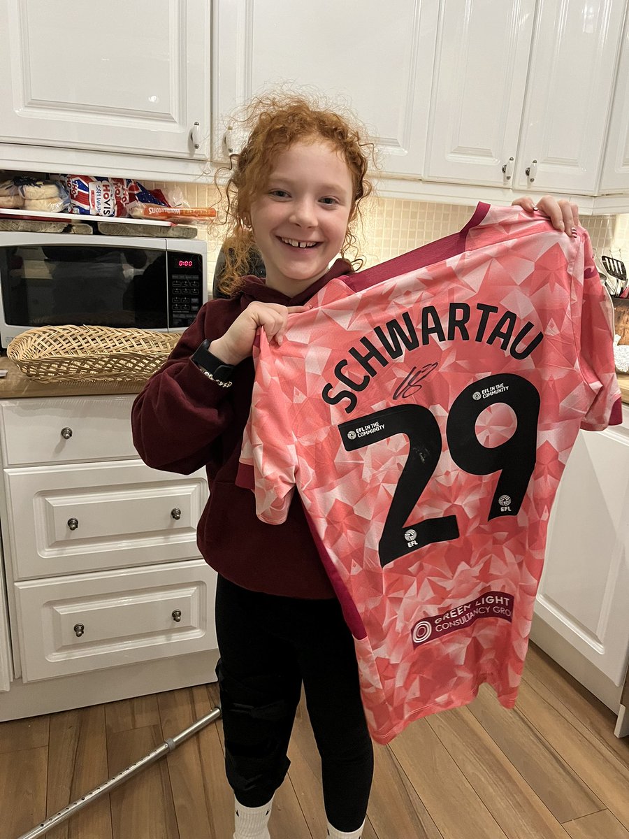 Az__07's tweet image. We won’t be at the game today due to Ella’s knee but will be watching on TV - first home game missed since start of last season! Ella was cheered up a lot yesterday after getting a @MatchWornShirt Oscar Schwartau shirt! @NorwichCityFC #NCFC 🟡🟢