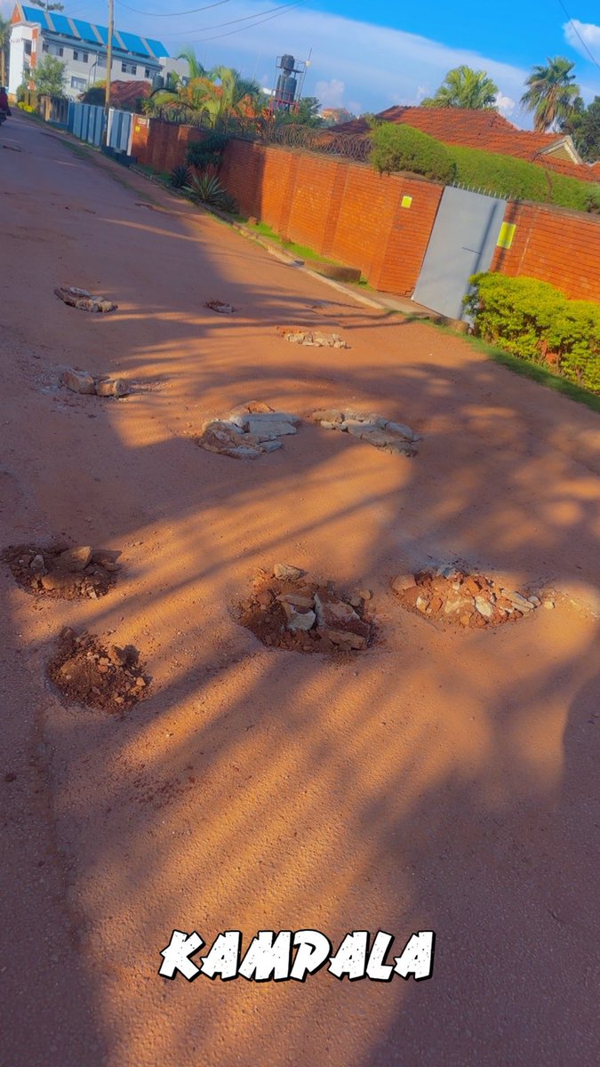 DenzelUG's tweet photo. Fed up with the potholes in my hood, decided to fix them myself. I don’t know who the local council guys are but these are such simple things they can do. 
#UgandaPotholeExhibition #Kampala https://t.co/sUzWiqhZpd