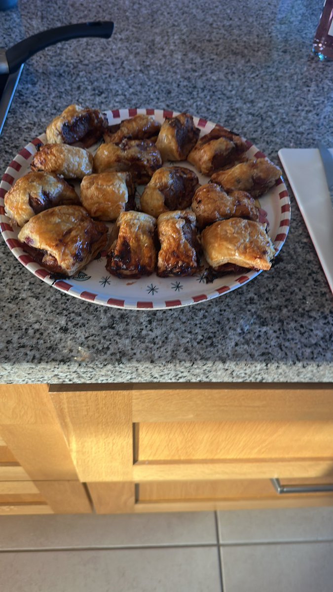 Festive sausage rolls… meat, Brie cheese, cranberry sauce, bacon… 🤤👌🏻