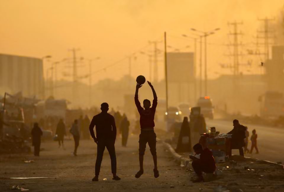 gazanotice's tweet photo. 🚨Among The Guardian’s “20 Photos of the Week”, an image from Nuseirat refugee camp in central Gaza Strip shows children playing with a ball, capturing a rare moment of normalcy amid widespread destruction.

Since the so-called ceasefire took effect, Israeli attacks have killed 418 Palestinians and wounded 1,112 over the past 78 days, including children.