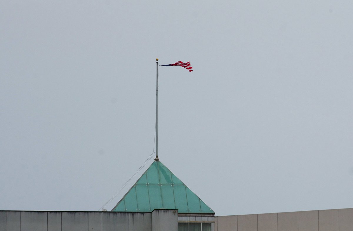 auweia1's tweet photo. Tattered American flag flaps forlornly atop 1145 Market, home of the SF Department of Public Health, due to recent storms/wind https://t.co/1hq2lBds3Q