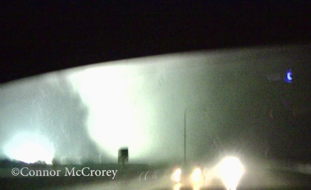 StormChaseTV's tweet photo. 10 years ago tonight, a GIANT EF4 #tornado killed 10 people in Dallas suburbs. 9 of the fatalities were in vehicles, at the interchange @ConnorWX had passed 15 seconds earlier. This was the view out his back windshield as he barely escaped. https://t.co/SceHirJ12A
