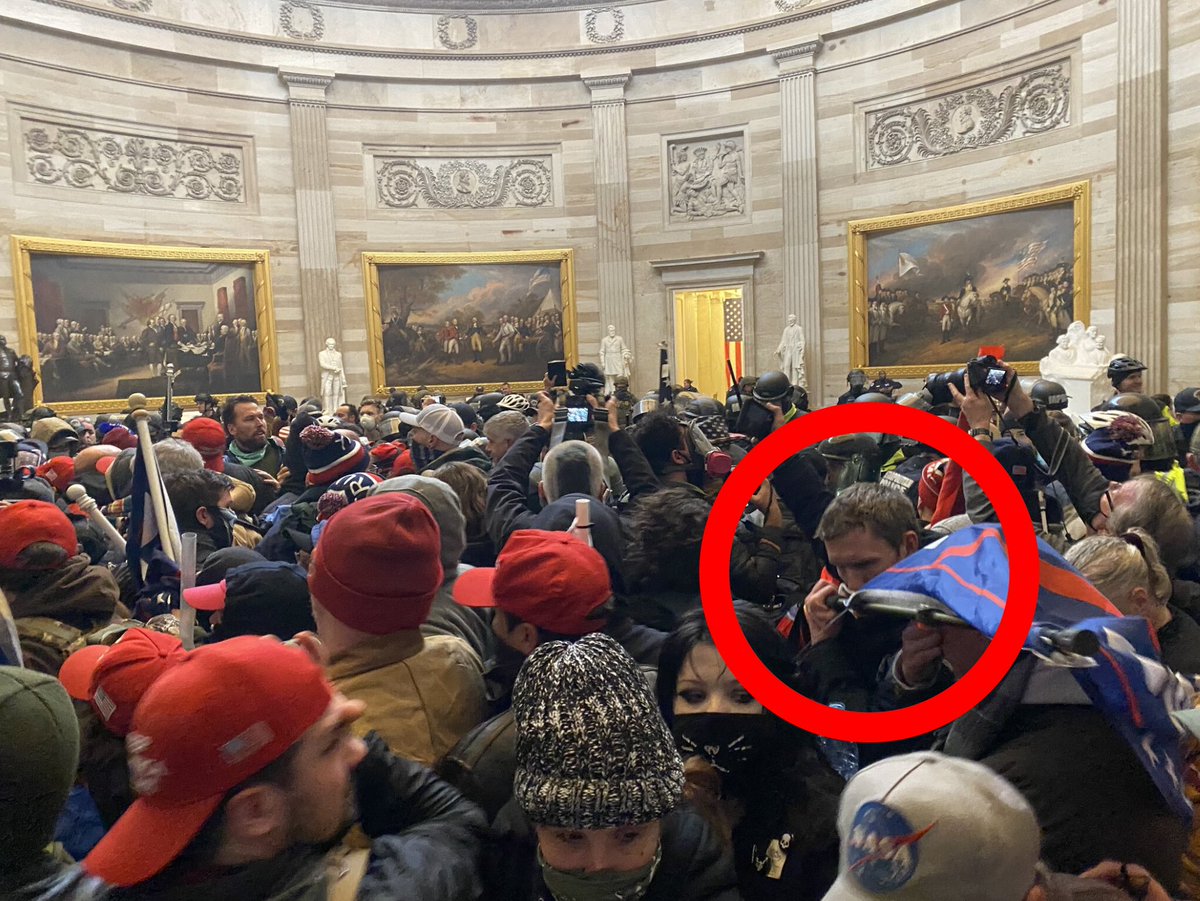FedsOfJ6's tweet photo. HUGE: He walked in the building with his face covered carrying a Trump flag. https://t.co/uL00EzcXtm