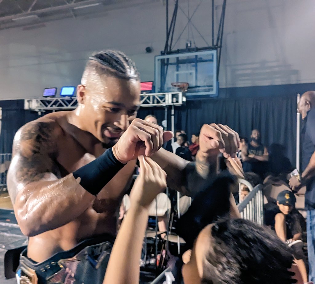 And New! Here's one fan excited for the champ! And she's been a fan from day one. <a href="/Carmelo_WWE/">Carmelo Hayes</a> #SmackDown