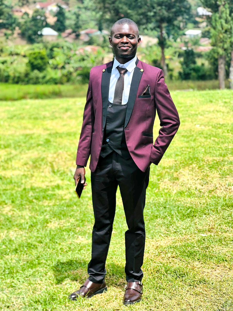 My first time in A suit 📍

Invited by My guy Rogers for his dad's wedding in Kabaale District 

Rate my smartness🥰😂

<a href="/karothk256/">Kasese's Finest 🇺🇬</a>