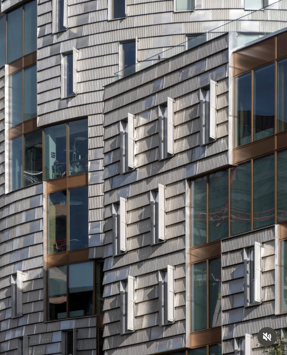 SustainableTall's tweet photo. Wind turbine blades recycled and used as solar shading on a skyscraper in Aarhus, Denmark. https://t.co/qLRG25Y1hW