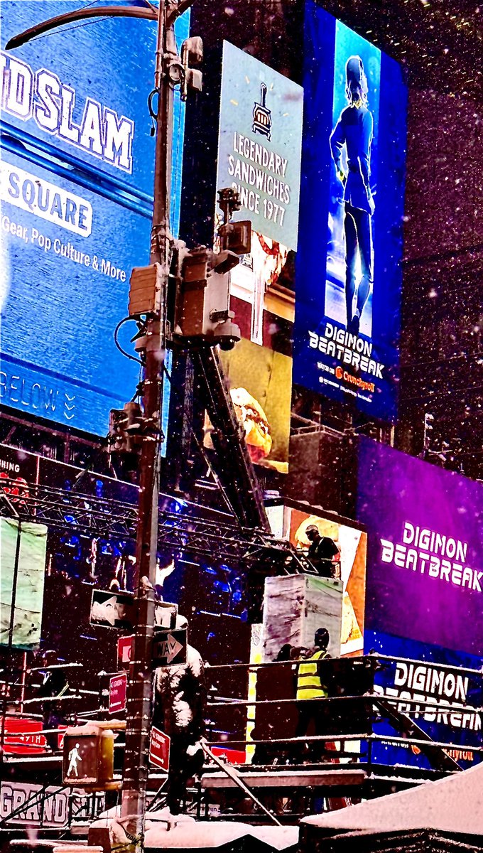 Putting up some of the rigging for the Times Square New Years Eve celebration in the middle of the night in a snow storm.