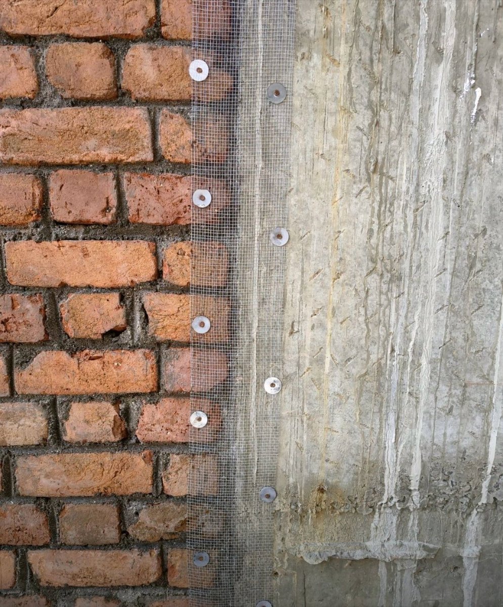 1. The mesh is installed where two different materials meet
2. It reinforces plaster, preventing cracks 
3. The mesh is secured with washers and embedded in mortar or plaster.
4. This method improves bonding and adds tensile strength to the wall.