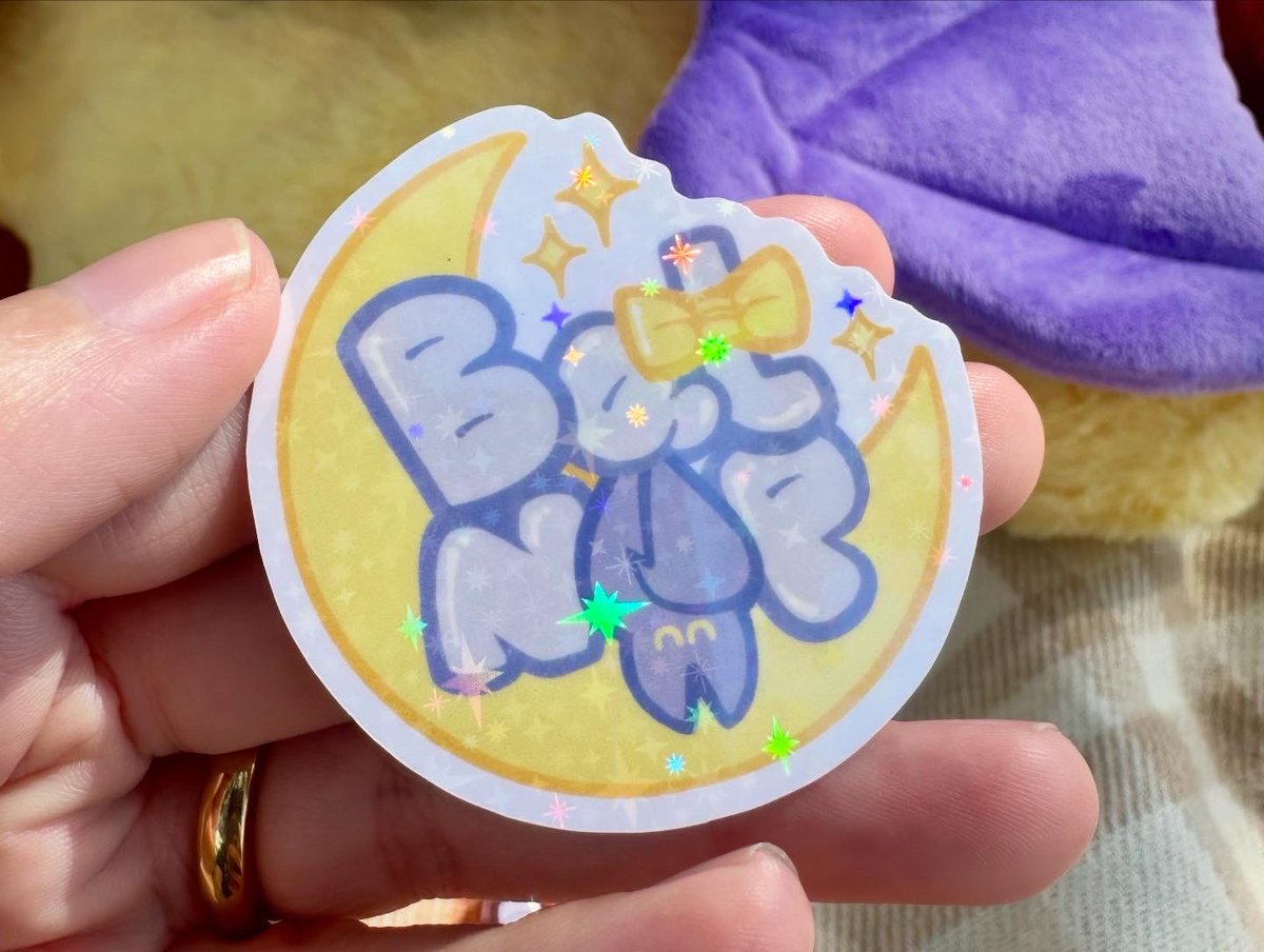 TwilightPalms's tweet image. Bat Nap weighted plushies are now fully stocked! They come with a free sticker, Eepy Elmer keychain, and 10% of profits go to Arizona bat rescue! Adopt Elmer today! 💜💛🦇 #bats