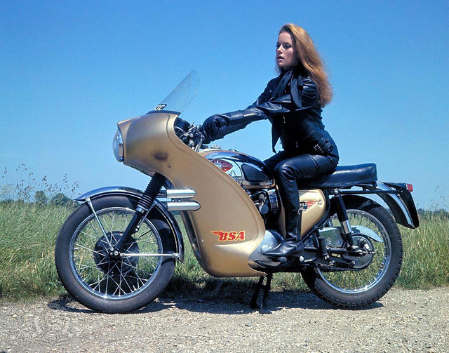 Thunderballs007's tweet photo. A promotional still of Luciana Paluzzi on location at Silverstone Circuit, Northamptonshire, England during filming for Thunderball (1965) https://t.co/3GJvOv0i3A