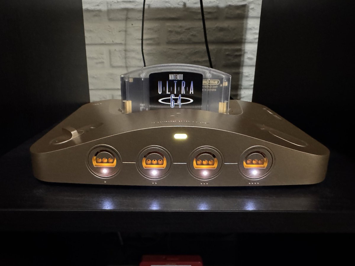 ORoake's tweet image. Oh yeah, digging the gold on the @analogue 3D much more than white. Almost makes up for missing out on the Toys 'R Us gold N64 back in the day.