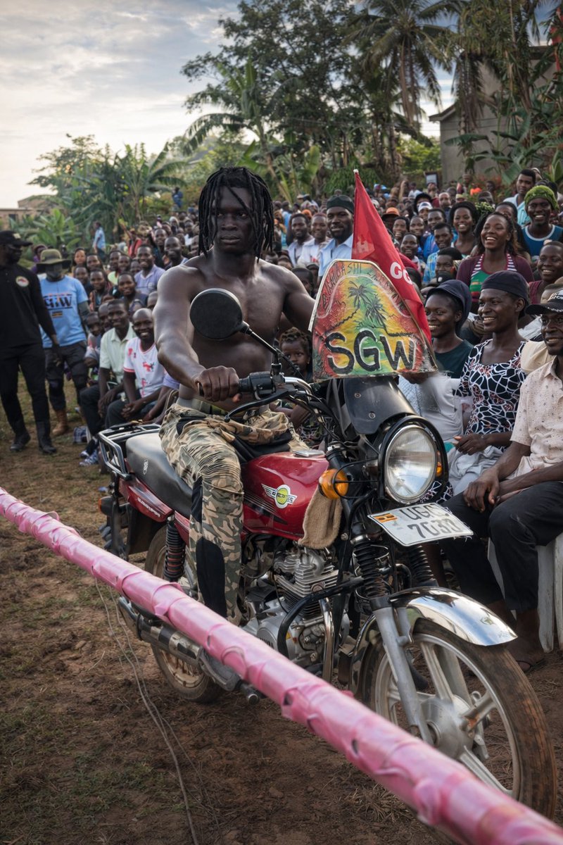 SGWug's tweet photo. 🔥🏍️ ARMY MADE A STATEMENT BEFORE THE FIGHT EVEN STARTED! 🏍️🔥

ONE MAN ARMY didn’t walk into the arena…
He RODE IN with purpose 😤💪

The motorcycle entrance ahead of the I QUIT MATCH sent shockwaves through Mukono — intimidation, confidence, and WAR written all over it.

This wasn’t just an entrance.
It was a message to Hamis Diamond and the entire SGW locker room.

⚠️ When Army rides in like that, someone is about to be pushed to the limit.

📍 SGW MASSACRE – Boxing Day
📺 Full I QUIT match now on SGW Wrestling Uganda

#SGWMassacre #IQuitMatch #OneManArmy #SGWUganda #MotorcycleEntrance #AfricanWrestling #MudWrestling #BoxingDayMadness