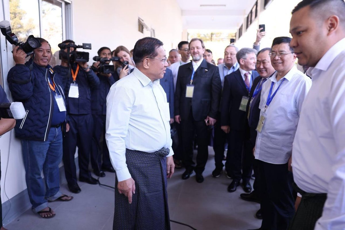 IrrawaddyNews's tweet photo. Election observers from the junta’s allies, including Chinese Special Envoy Deng Xijun, posed with Myanmar junta chief Min Aung Hlaing in Naypyitaw in images shared by pro-military channels. Poll monitors from Russia, China and elsewhere have arrived. #WhatsHappeningInMyanmar https://t.co/YatL0uoXEZ