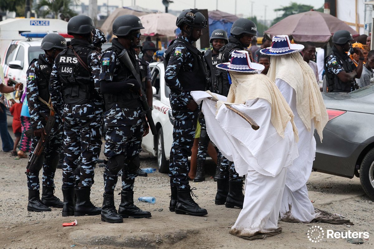 sodiqadelakun's tweet photo. Masquerades wearing traditional Eyo attire take part in the Eyo Festival, also known as the Adamu Orisa Play, in Lagos, Nigeria, December 27, 2025. REUTERS/Sodiq Adelakun #EyoFestival2025 #EyoFestival #Eyo2025 #Eyo #Lagos #Nigeria https://t.co/yLjaU4XtGr