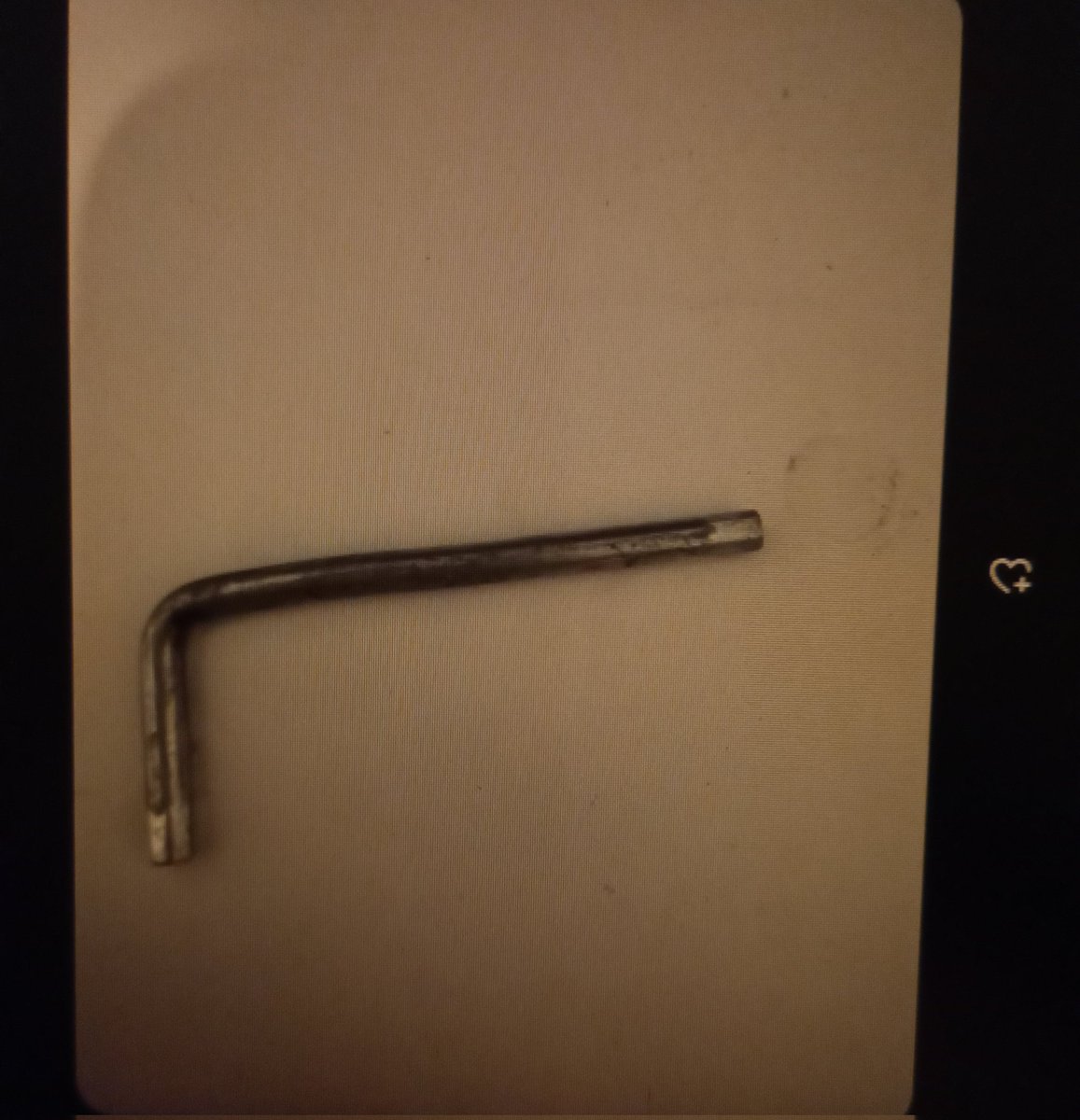 L-shaped metal tool for task