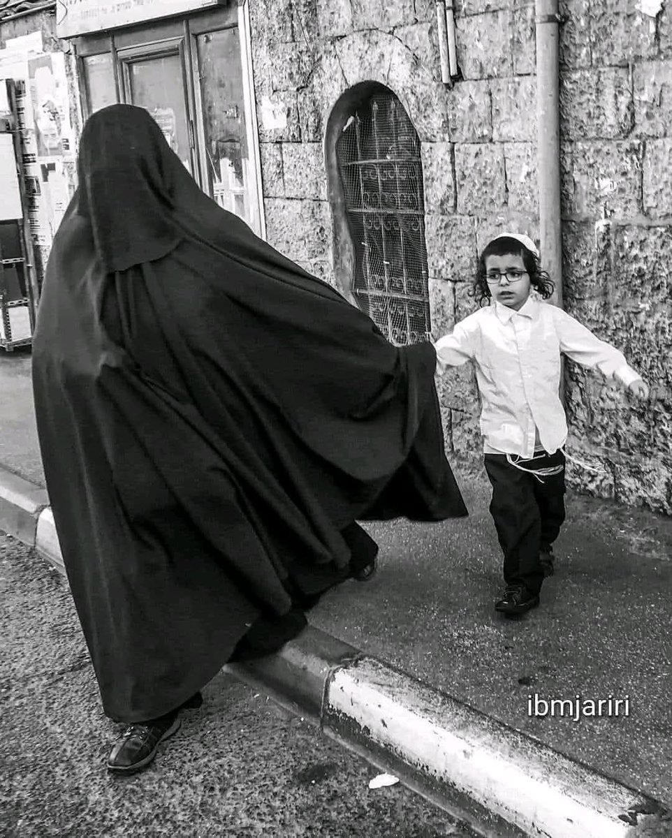 She's not Muslim, calm down. She's just a Haredi.

 Only  Muslim hijab gives  you a headache and makes  you scream.