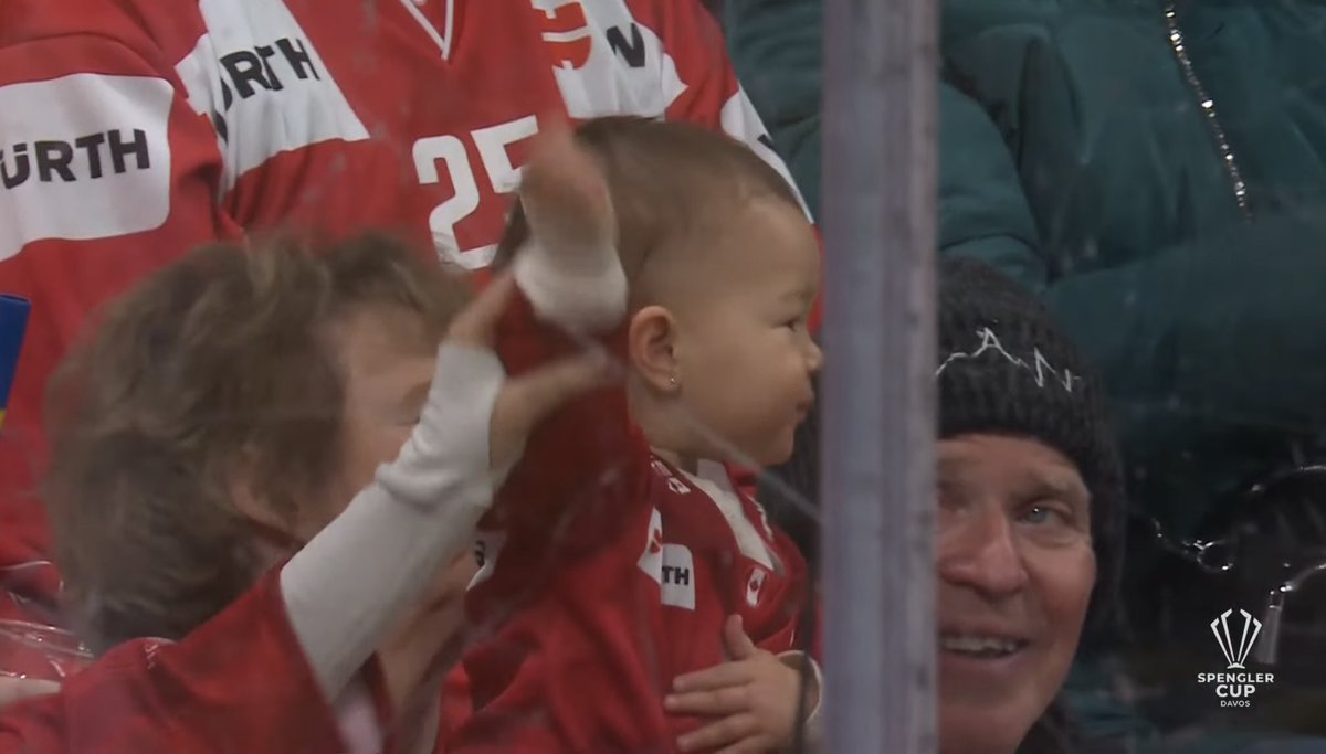 will_hay23's tweet photo. I’ve watched hockey for years, and never seen anything better than this Canadian child at the #SpenglerCup throwing M&amp;Ms onto the ice and then celebrating #ThePeakOfHockey https://t.co/DCwInCnfpN