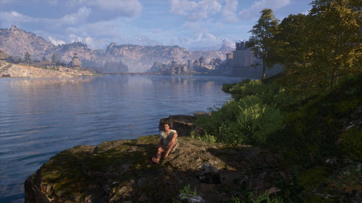 Beautiful spot for a picnic. Shade, sun, water, and a bridge in the background.
#PaxDei #JustCreators <a href="/PlayPaxDei/">Pax Dei</a> <a href="/JustAbout__/">Just</a>