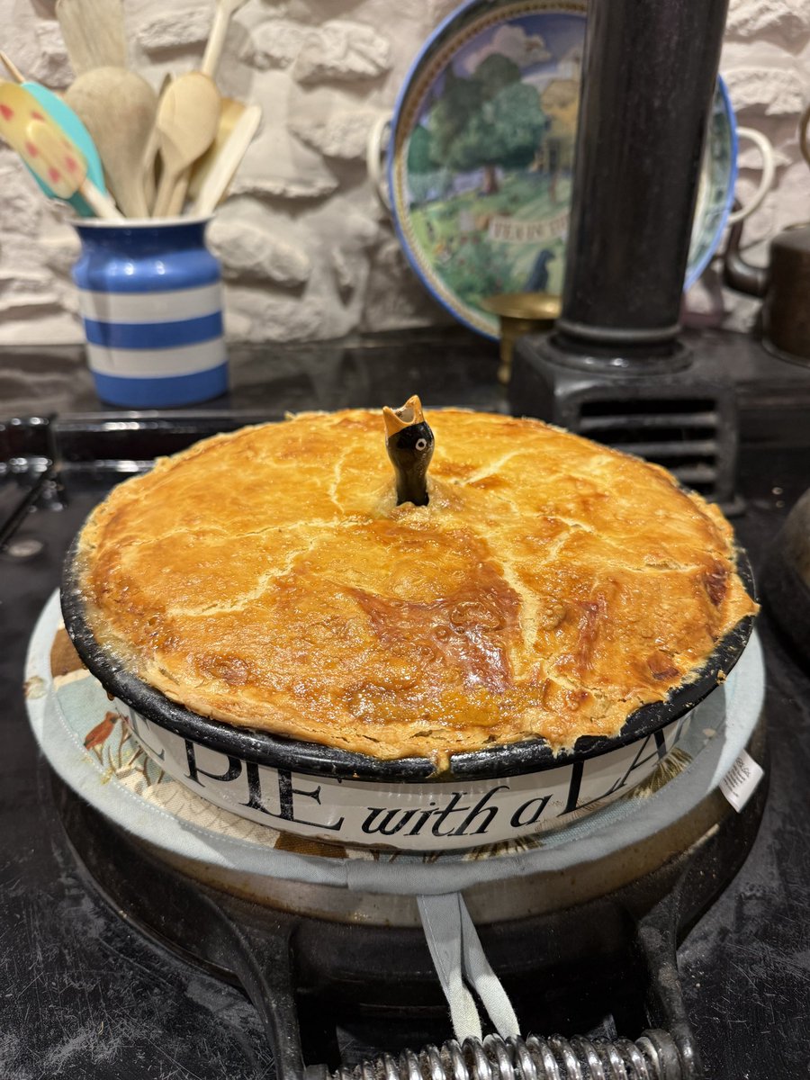 Grandmothers Clarice Cliff pottery bird funnel in use on a turkey pie tonight.