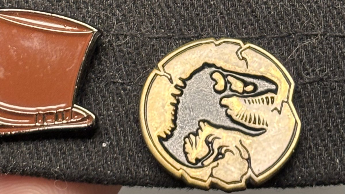 One of my bosses at work found a spare Jurassic World Dominion pin given out to employees only a few years ago! And gave it to me!!