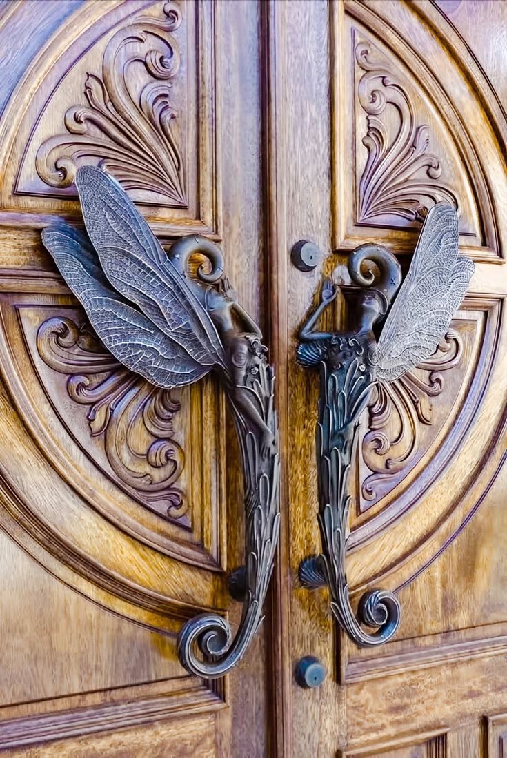 Art Nouveau fairy door handles from the late 19th or early 20th century.