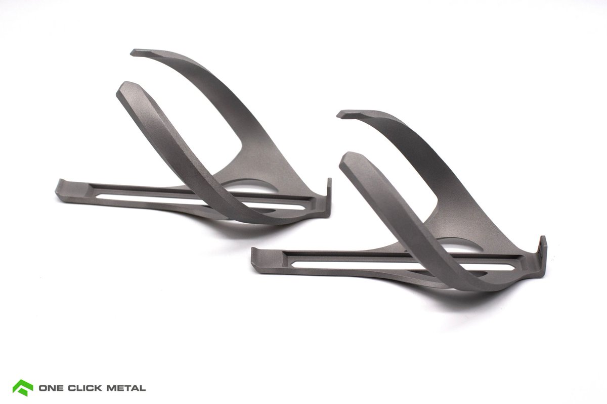 iALTEM's tweet photo. Metal 3D-printed bike bottle holder 🚲
Printed in titanium, the holders are lightweight, strong, and designed to keep the bottle secure during rides.
Using MPRINT, each holder takes approximately 2 hours and 50 minutes to print. 
👉 Get in touch : 0804150 6070
| enquiry@altem.com https://t.co/E6fx7b26TT