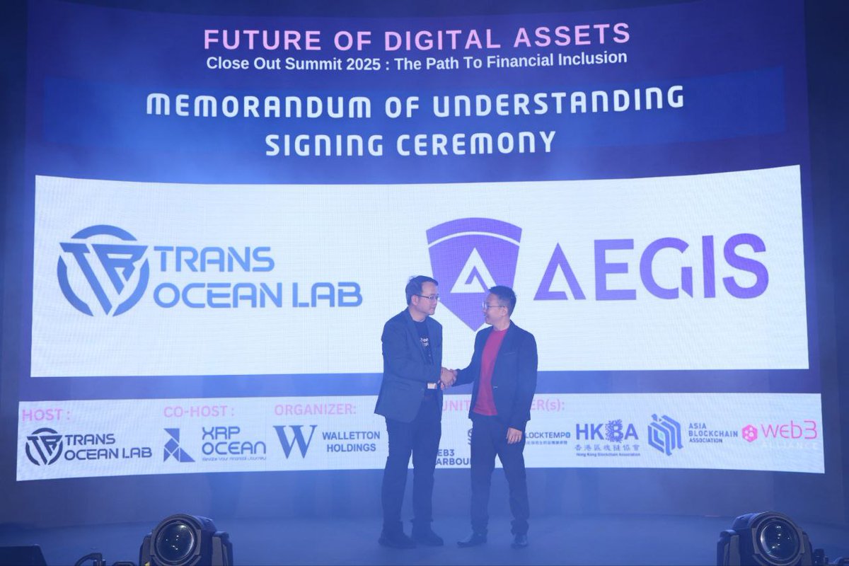XrpOcean's tweet photo. Early last week, an on-stage MOU was signed to deploy institutional-grade liquidity into structured yield strategies on Ingots International’s Dual Asset Trading platform, together with @Wallet_Aegis.

The structure starts with an initial allocation of up to $1M, with room to scale based on performance.

With @Transoceanlab involved, this marked a concrete step toward risk-controlled, institutional liquidity execution on the #XRPL.